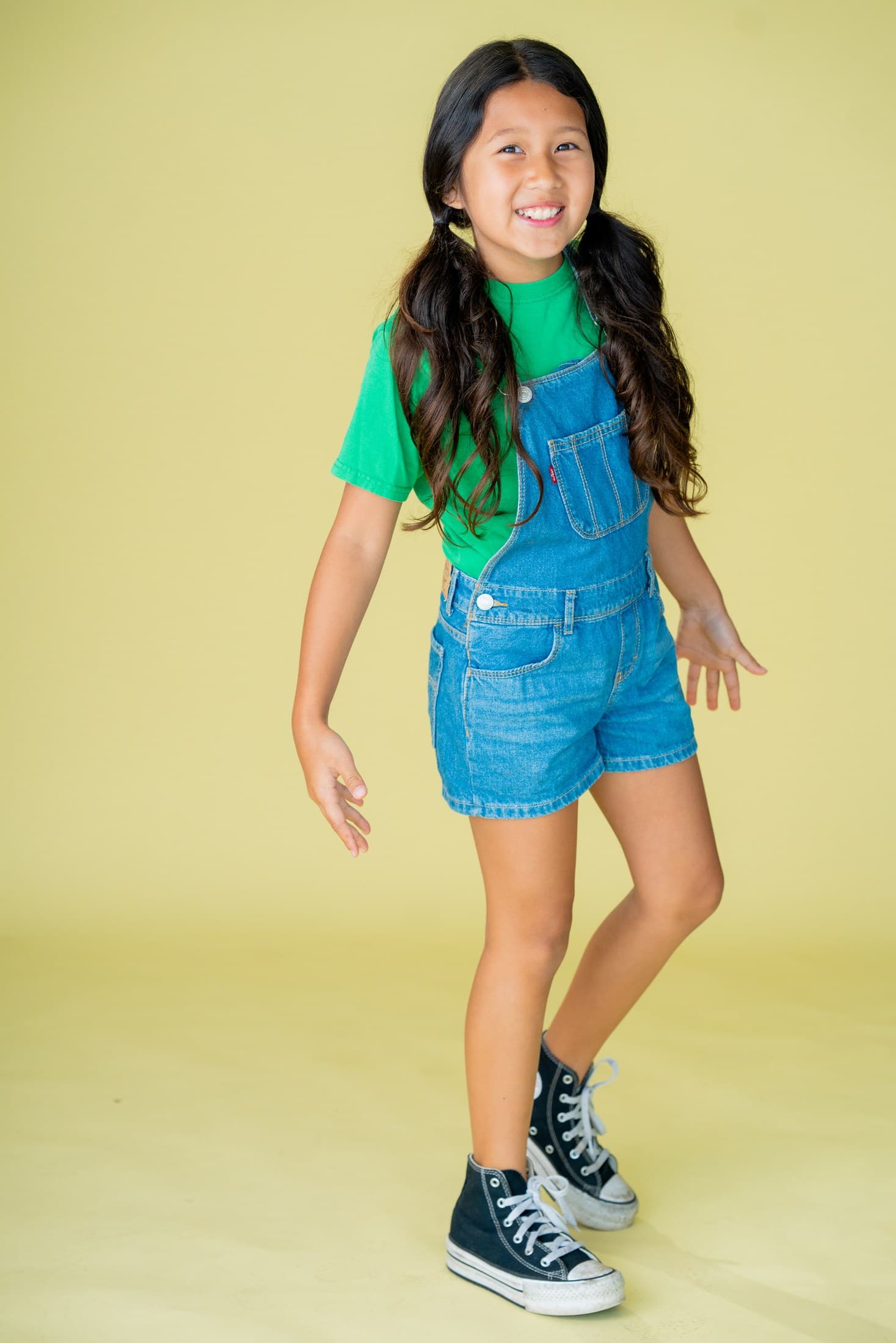 Kylie Akimoto in a bright commercial studio portrait