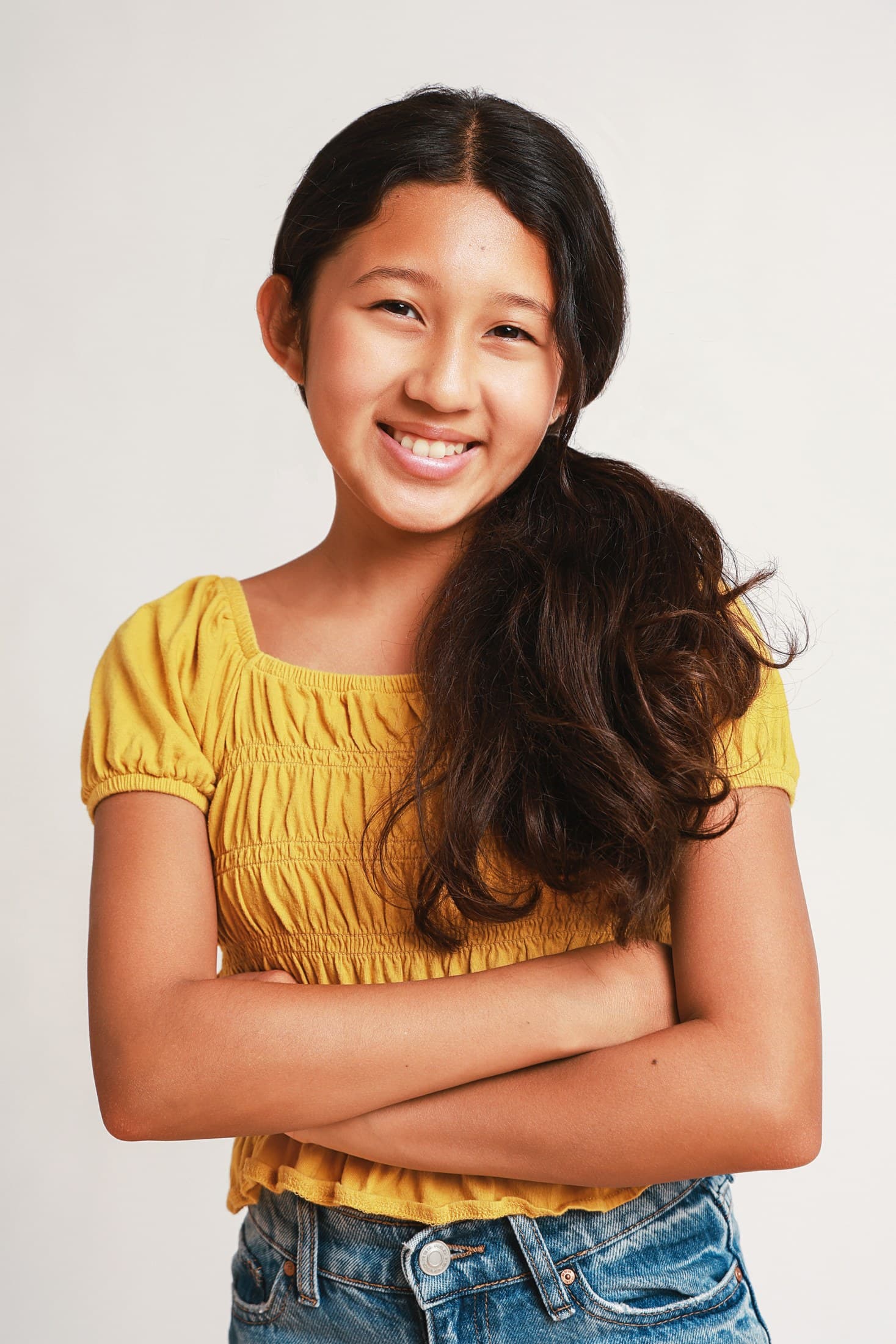 Kylie Akimoto smiling in a current professional headshot